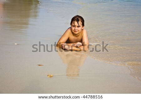 Similar – One happy little boy playing on the beach