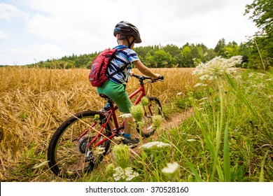 Young Boy Mountain Biking