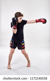 Young Boy Muay Thai Fighter In Various Postures