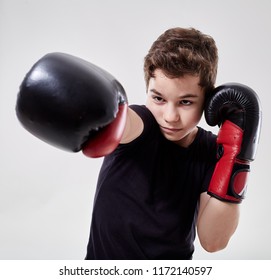 Young Boy Muay Thai Fighter In Various Postures