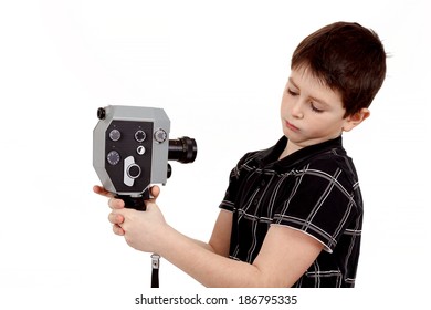 Young Boy With Old Vintage Analog 8mm Camera Filming Yourself