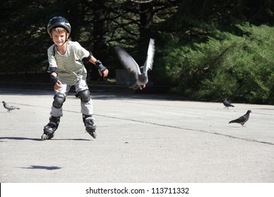young boy on roller skates outdoors