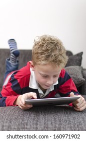 Young boy on tablet pc