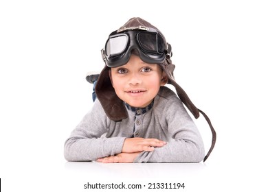 Young Boy With Pilot  Helmet Isolated In White