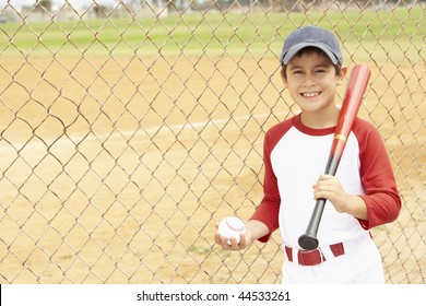 Young Boy Playing Baseball
