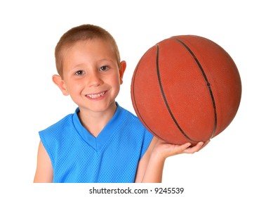 Young Boy Playing With A Basketball Isolated On White