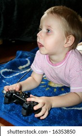 young boy is playing computergames