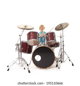 Young Boy Playing Drums Against White Background