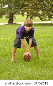 Young Boy Playing Football - Black And White Images Have Selected Color With Football