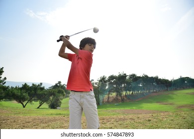 Young Boy Playing Golf Golf For Kids Lessons