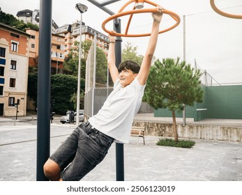 Young boy playing on monkey bars in an outdoor playground, smiling as he swings from one bar to another. - Powered by Shutterstock