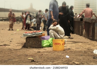  A Young Boy Selling On A Crowded Place Near Kemari Port Karachi, Pakistan  June 24th, 2018