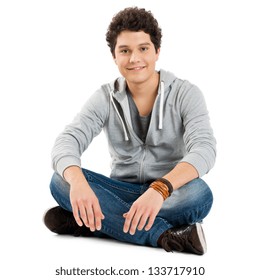 Young Boy Sitting Isolated On White Background