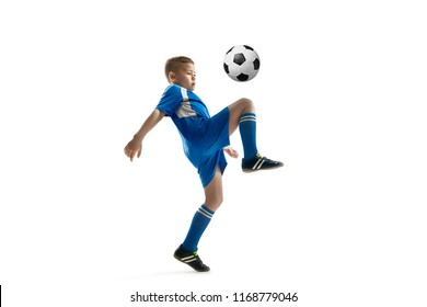 Young Boy With Soccer Ball Doing Flying Kick, Isolated On White. Football Soccer Players In Motion On Studio Background. Fit Jumping Boy In Action, Jump, Movement At Game.