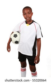 A Young Boy With A Soccer Ball. Isolated On White