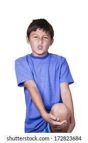 Young Boy With Sore Leg And Knee On White Background 