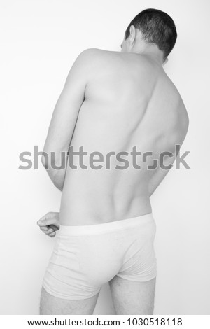 Young Boy Standing In Underwear Boxer A Man In His Underwear Stands Near The White Young Boy Standing In Underwear Boxer A Man In His Underwear Stands Near The White