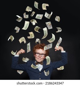 Young Boy Strong Kid Win A Lot Of Money On Black Background