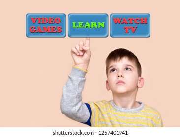 Young boy touching learn button on a virtual touch screen. Education concept. - Powered by Shutterstock - Get 15% off with code: PIKWIZARD15