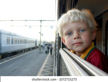 Young Boy In Train Window