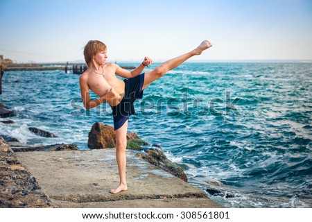 Young boy training karate Stock photo © 