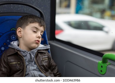 Young Boy Traveling By Bus