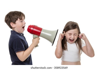 Young Boy Uses A Bull Horn To Speak Loudly Into A Girls Ear