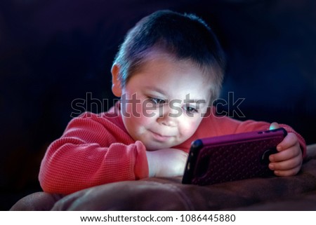 Similar – Little boy using a tablet