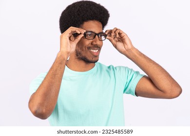 Young boy with vision problems wearing prescription glasses