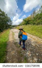 Young Boy Walking Up The Footpath Towards Kinder Scout, Edale, Peak District, England, UK