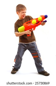 Young Boy With Water Gun Over White Background.