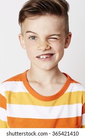 Young Boy Winking At Camera