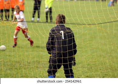 Young boys play football match and doing penalty kick - Powered by Shutterstock