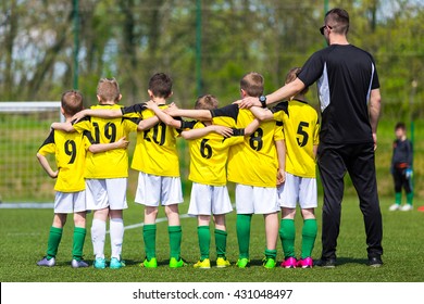 Young boys in soccer team standing united together on the sports field. Penalty soccer game during soccer football tournament for youth european teams. - Powered by Shutterstock