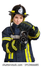 Young Brave Woman In Uniform, Hardhat Of Fireman Opens Valve On Fire Hose Nozzle For Use And Looking At Camera Isolated On White Background