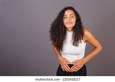 Young Brazilian Black Woman, With Cramps, Abdominal Pain.