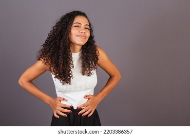 Young Brazilian Black Woman, With Cramps, Abdominal Pain.