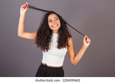 Young Brazilian Black Woman, Fiddling With Hair, Curls, Curly, Afro Hair. Pulling Hair