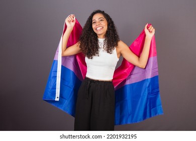 Young Brazilian Black Woman Raising Bisexual Flag, Bisexual Woman, LGBT, LGBTQ