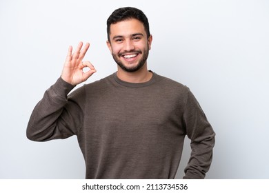 Young Brazilian man isolated on white background showing ok sign with fingers - Shutterstock ID 2113734536