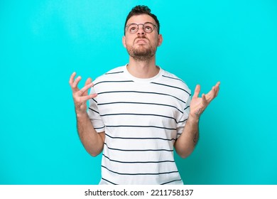 Young Brazilian Man Isolated On Blue Background Stressed Overwhelmed