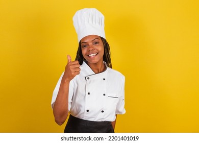 Young brazilian woman, chef, with thumb up, approval, like, affirmative. - Powered by Shutterstock