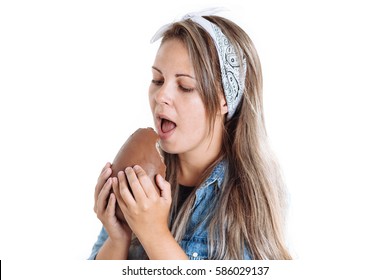 Young Brazilian Woman Eating Chocolate Easter Egg