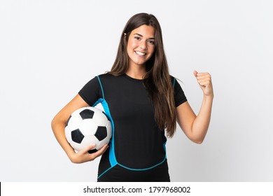 Young Brazilian Woman Isolated On White Background With Soccer Ball Celebrating A Victory