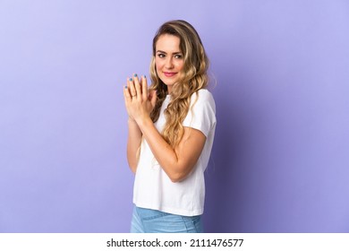 Young Brazilian woman isolated on purple background scheming something