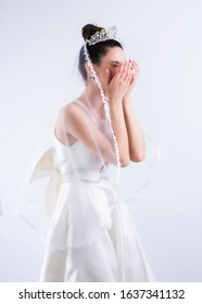 Young Bride Crying Isolated On Gray Background