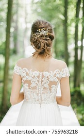 Young Bride And Details Of Her Gown: Elegant Back Of Wedding Dress And Hair Accessories