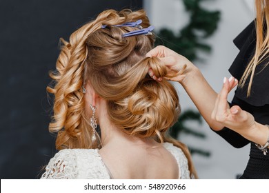 Young Bride Getting Her Hair Done Before Wedding By Professional Hair Stylist