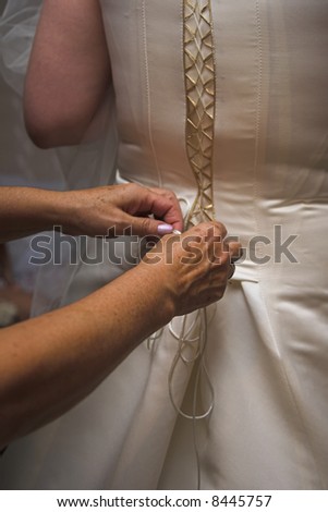 young bride is getting ready for wedding ceremony