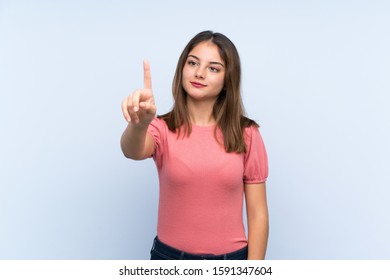 Young brunette girl over isolated blue background touching on transparent screen - Powered by Shutterstock